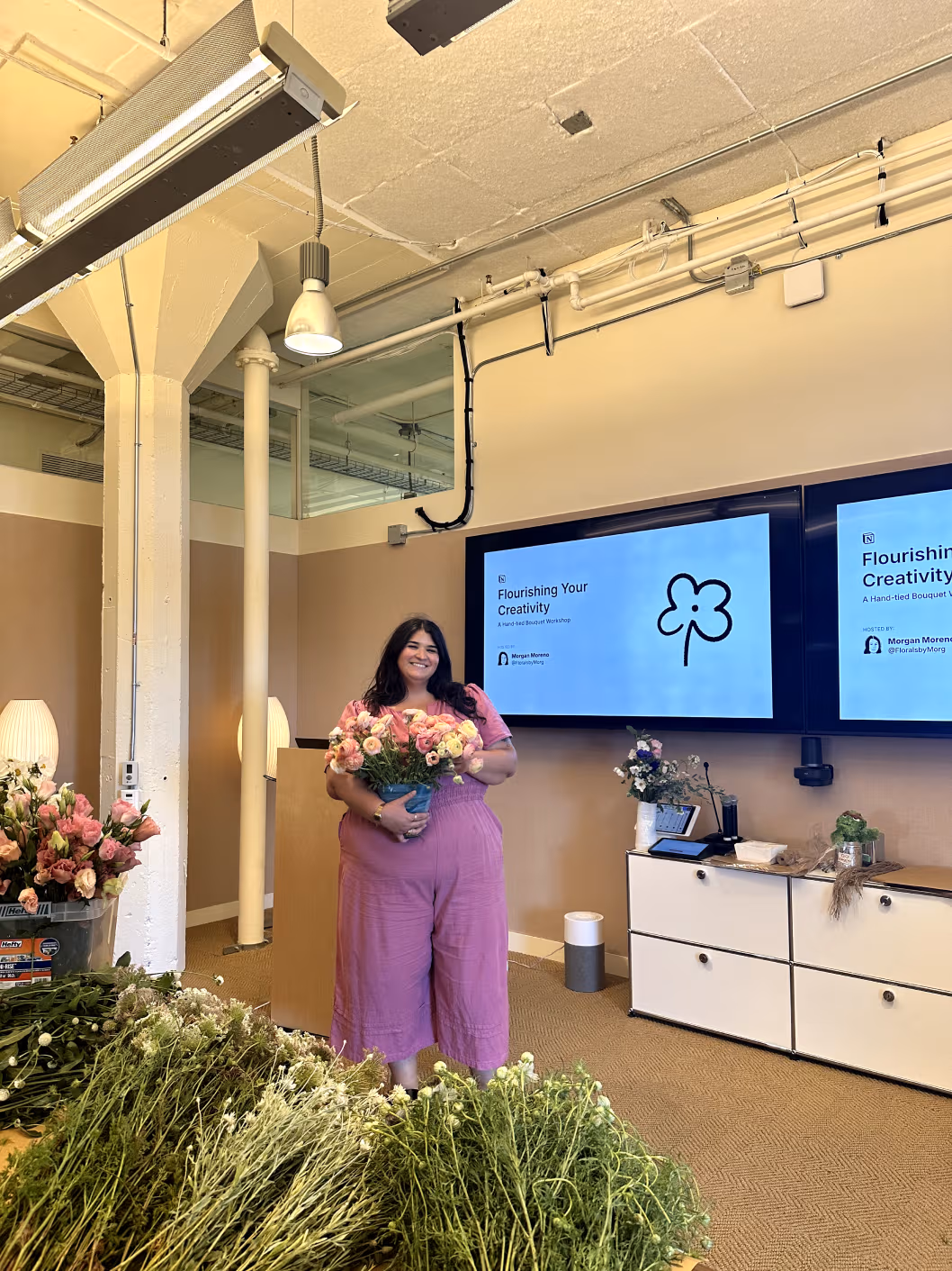 Morgan Moreno, Employer Branding Program Manager, leading a session on floral design